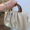 کیف زنانه و دخترانه دسته چوبی چروک چرم مصنوعی - Image 5
